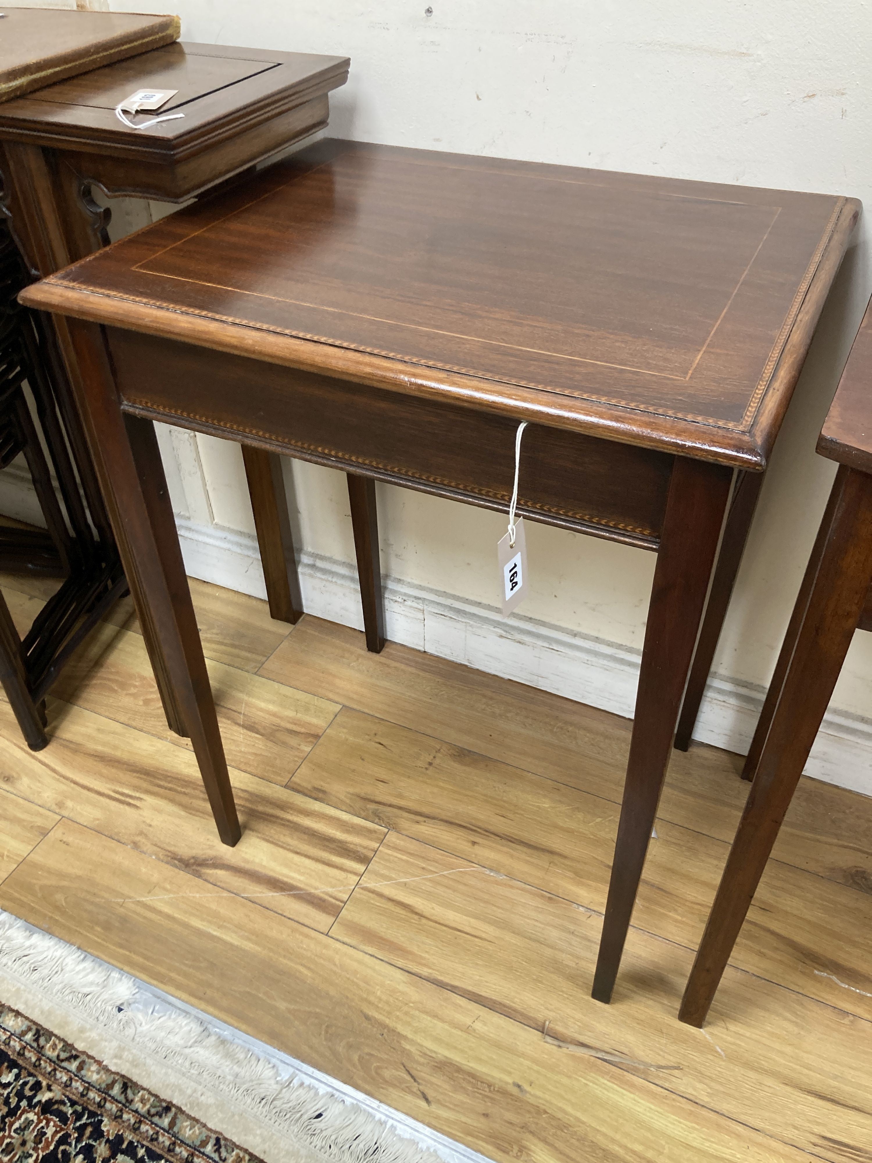 An Edwardian rectangular mahogany occasional table. W-57, D-47, H-73cm.